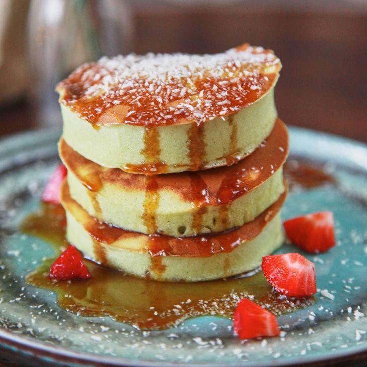 stack of pandan pancakes with gula melaka syrup drizzled on top