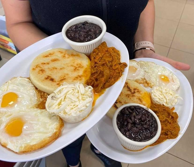South American breakfast arepas with eggs and beans