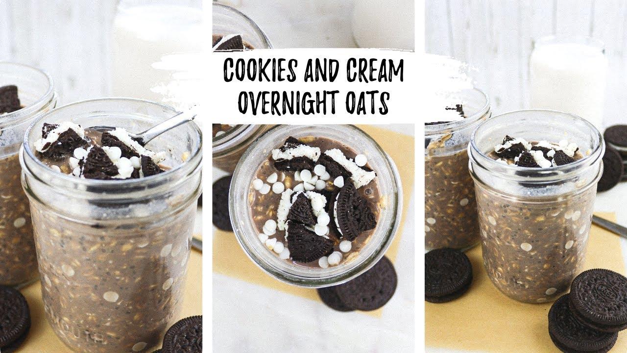 person scooping cookies and cream overnight oats from a mason jar