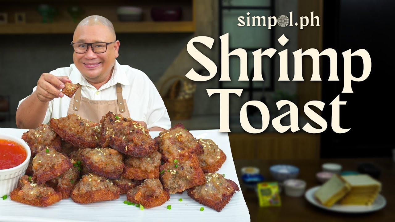 Person enjoying homemade shrimp toast at a party