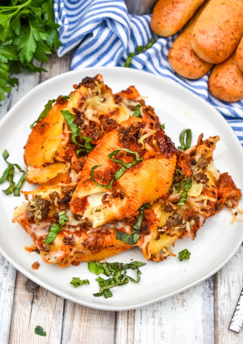 plated portion of slow cooker chicken and spinach stuffed shells