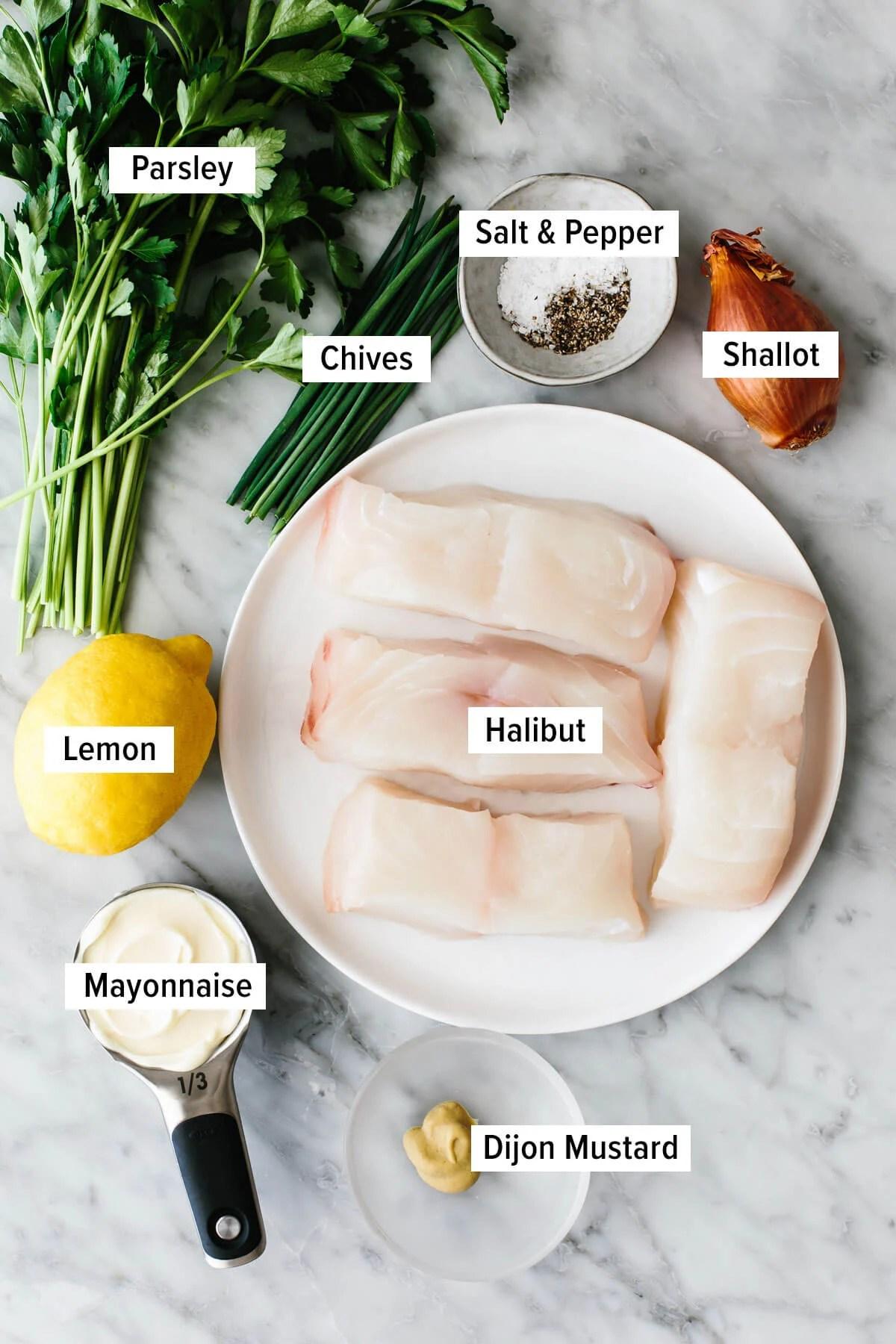 ingredients for baked halibut arranged on a table