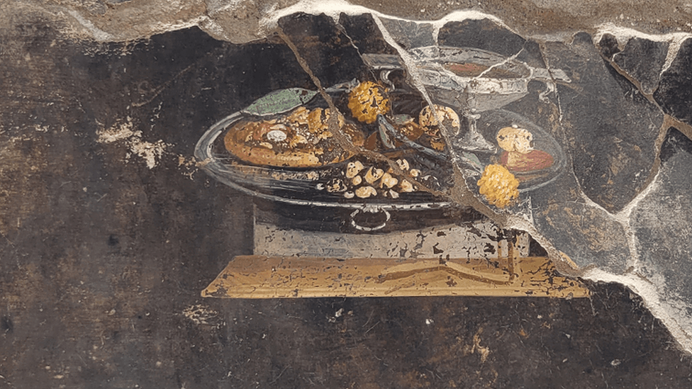 archaeologist unearthing pizza