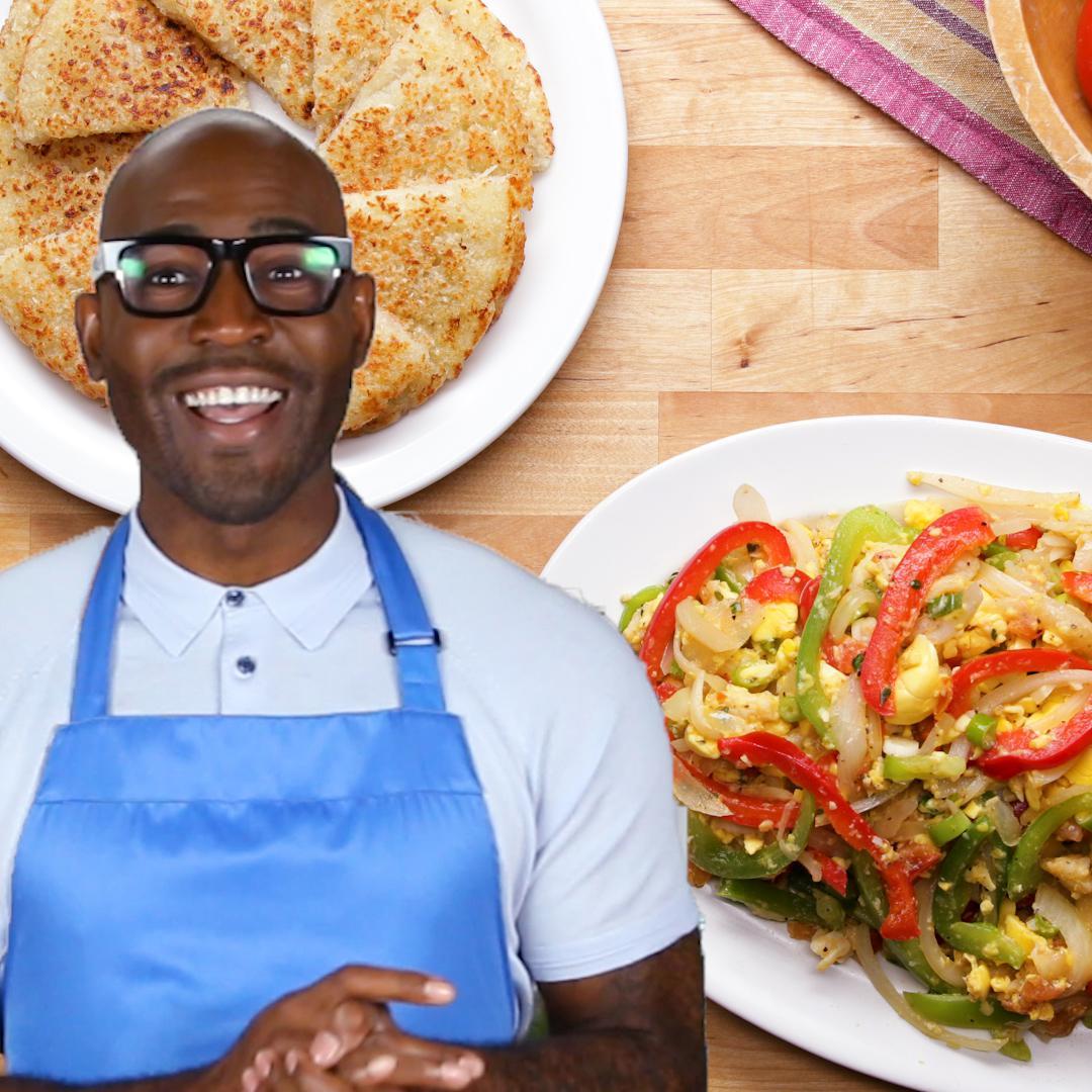 a person holding a saltfish and ackee roti breakfast bowl