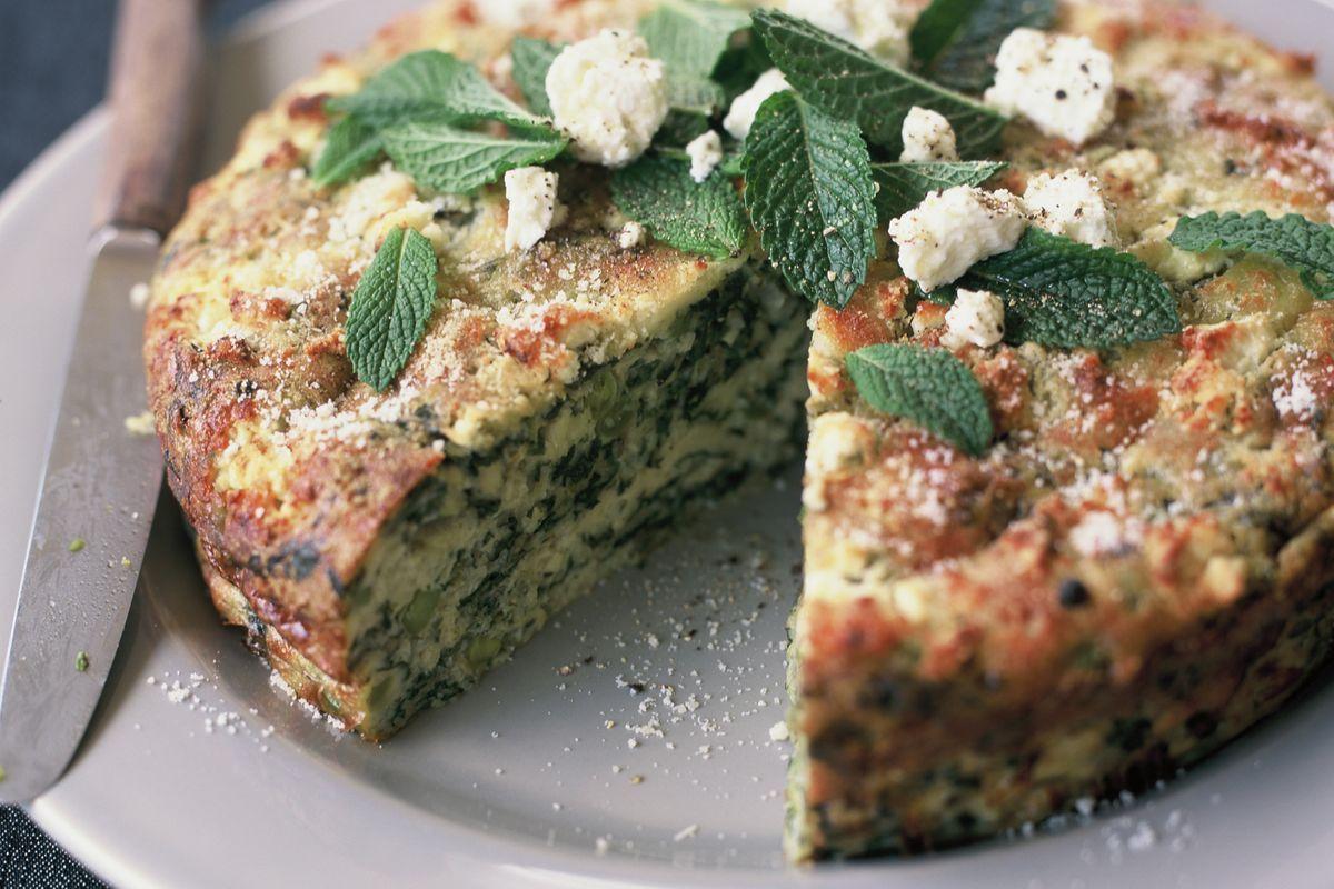 Pea and Mint Frittata with Burrata on a rustic wooden table