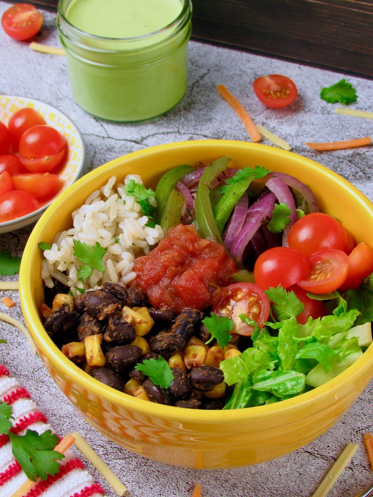 overhead shot of a vibrant plant-based meatball burrito bowl with cilantro-lime rice