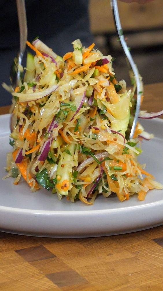 Sauerkraut and Glasswort Salad with Olive Oil on a rustic plate