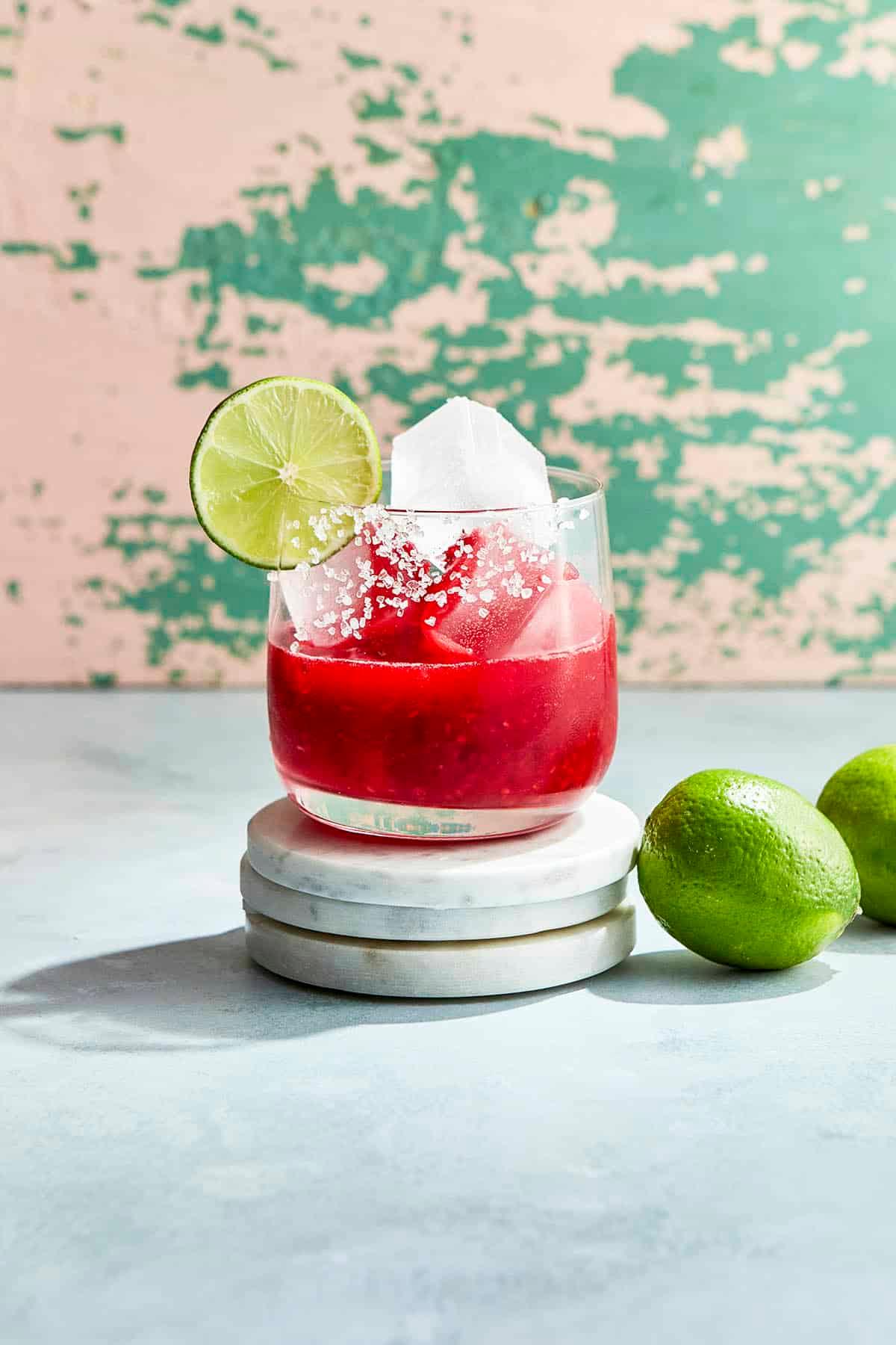 Refreshing summer raspberry mocktail with lime garnish