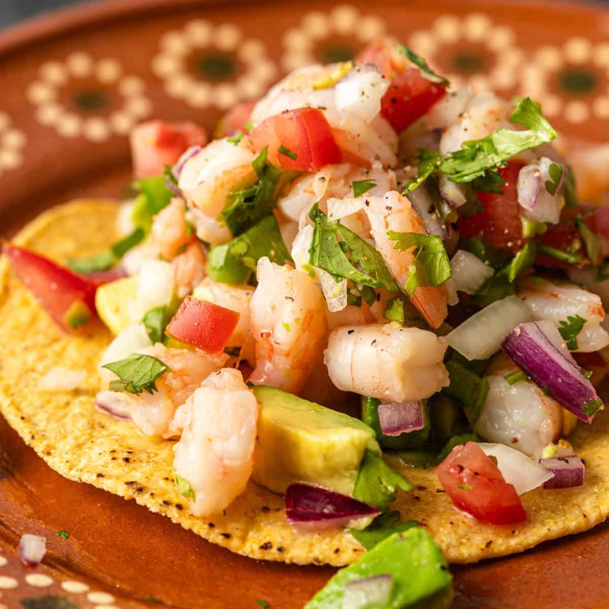 Close-up of a single shrimp ceviche wrap, showcasing the ingredients