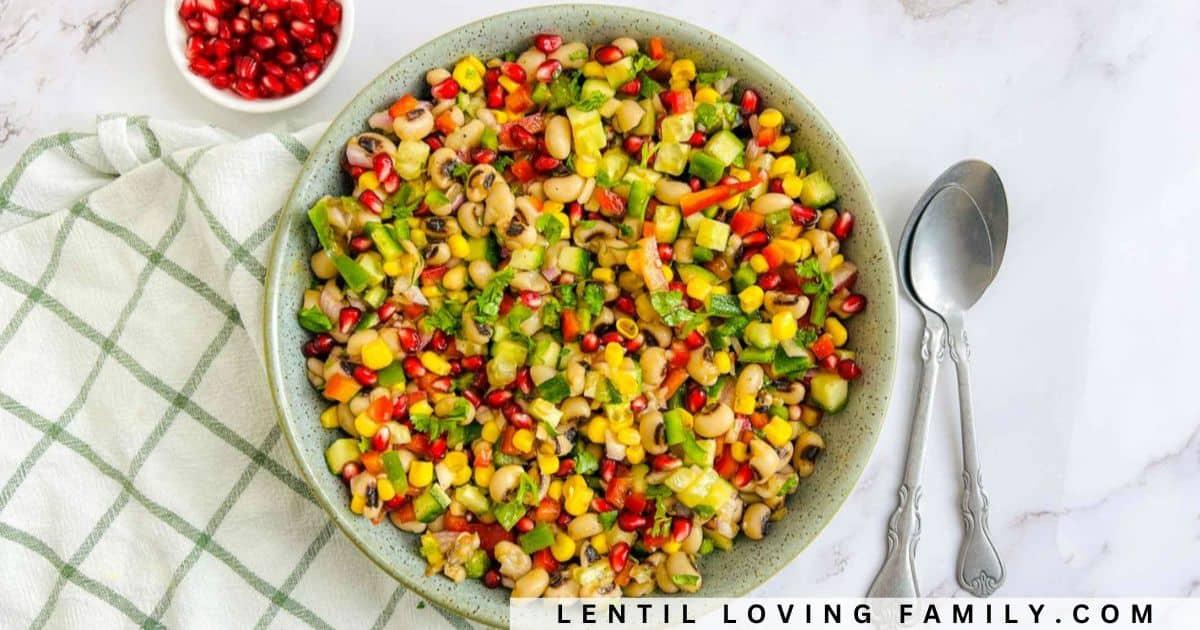 a vibrant bowl of barley and black-eyed pea salad at an outdoor picnic
