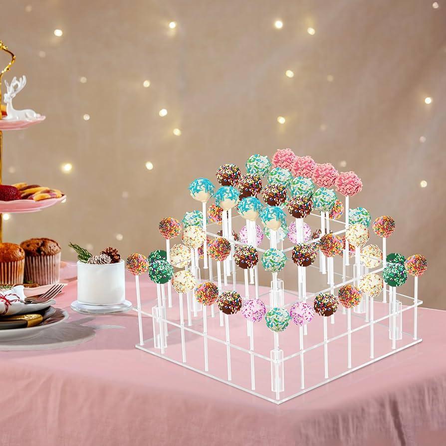 lemon thyme cake pops displayed on a tiered stand