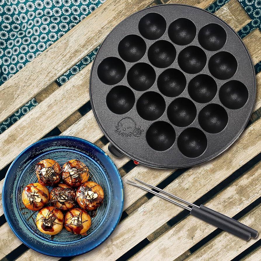 Close-up shot of a sizzling takoyaki pan with herring takoyaki