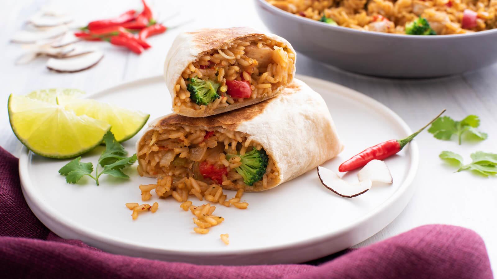 step-by-step photos showing how to assemble a coconut curry chicken burrito