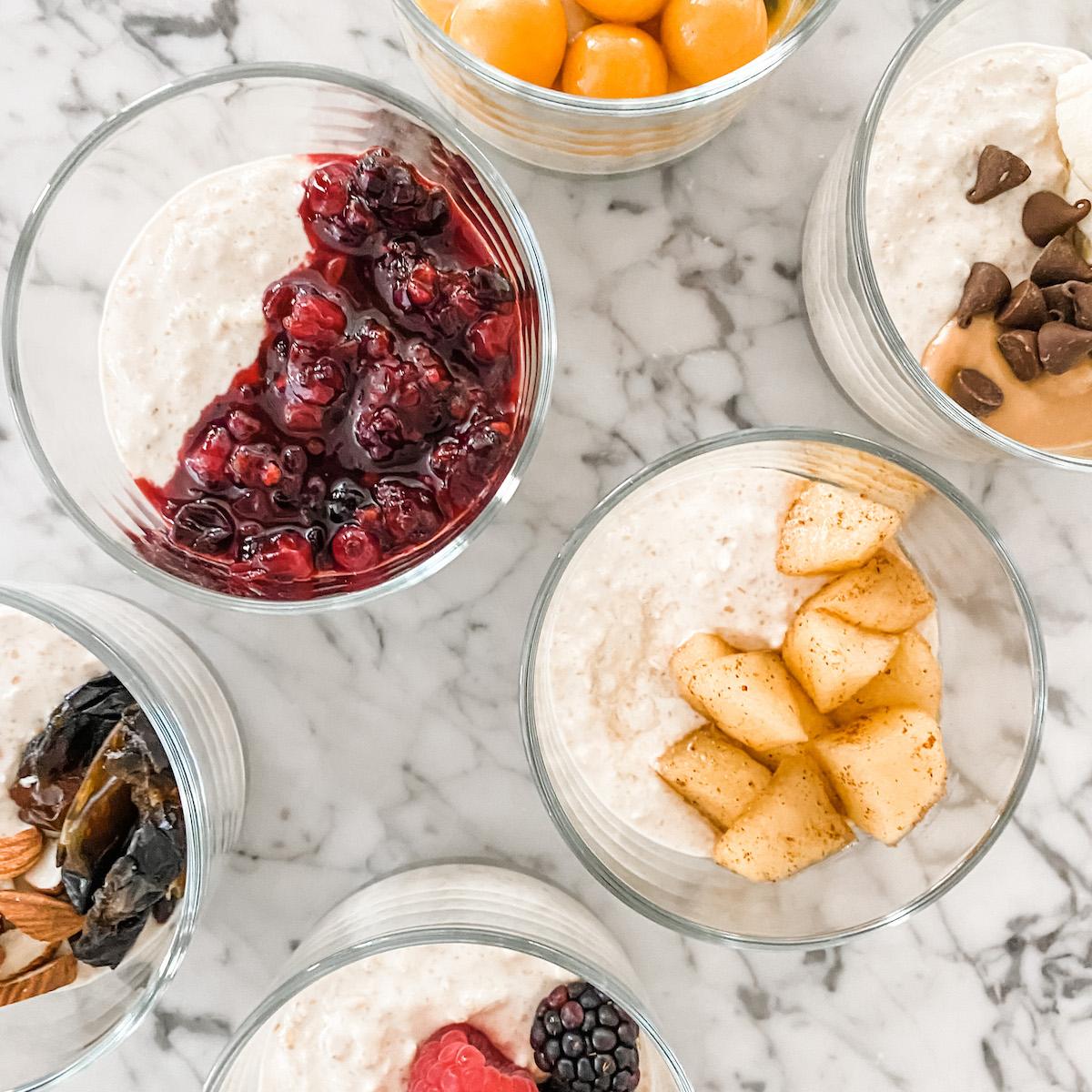 Three bowls of overnight oats with different toppings