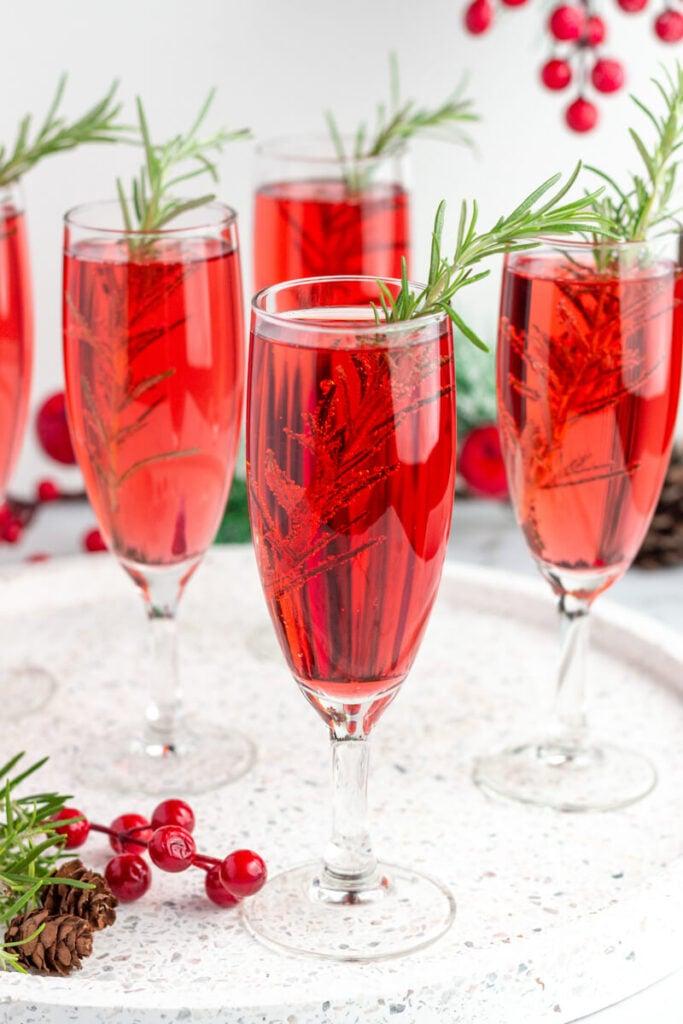 elegant non-alcoholic holiday mocktail in a champagne flute, festive setting