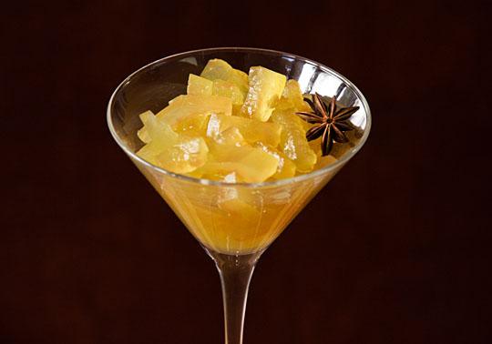 close-up of golden watermelon rind crisps with fresh mint garnish