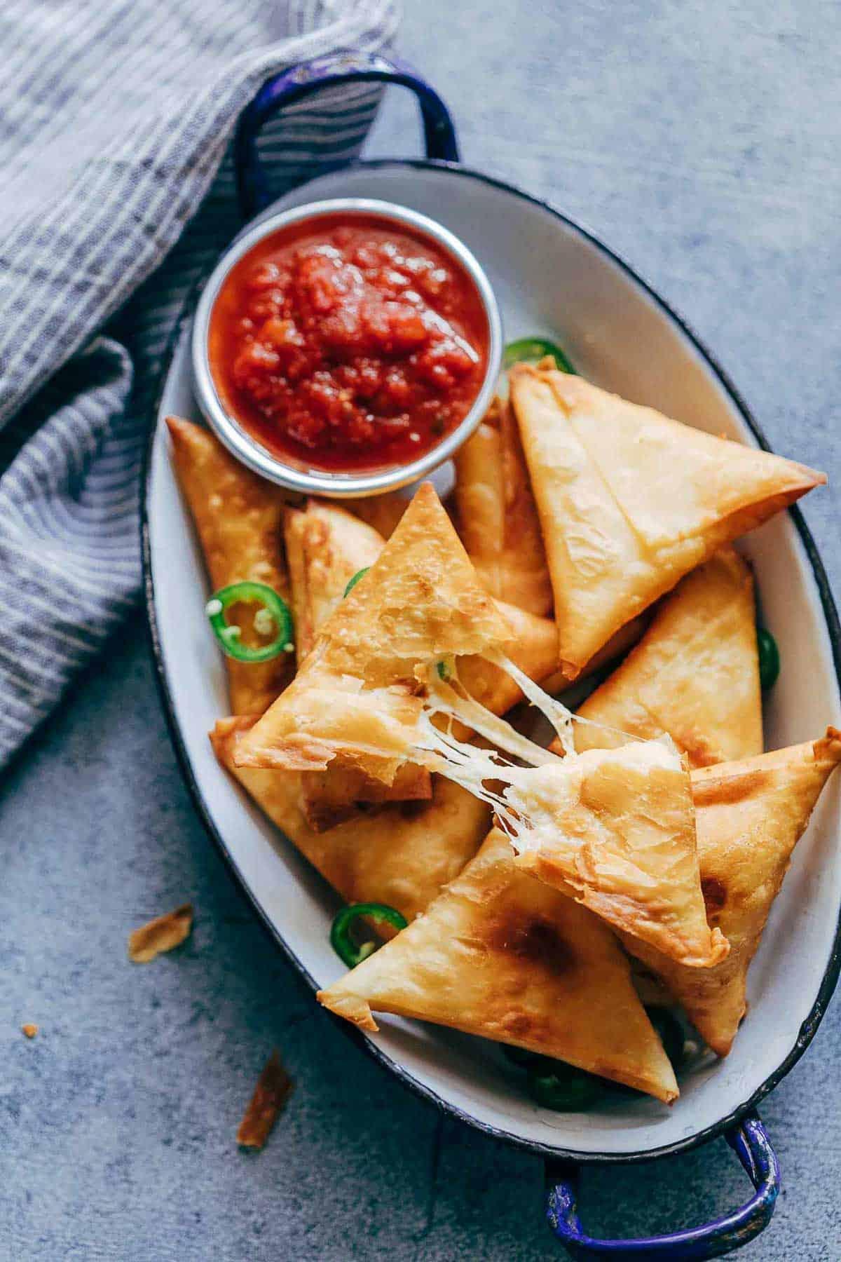 Chili Cheese Fries Samosas on a plate