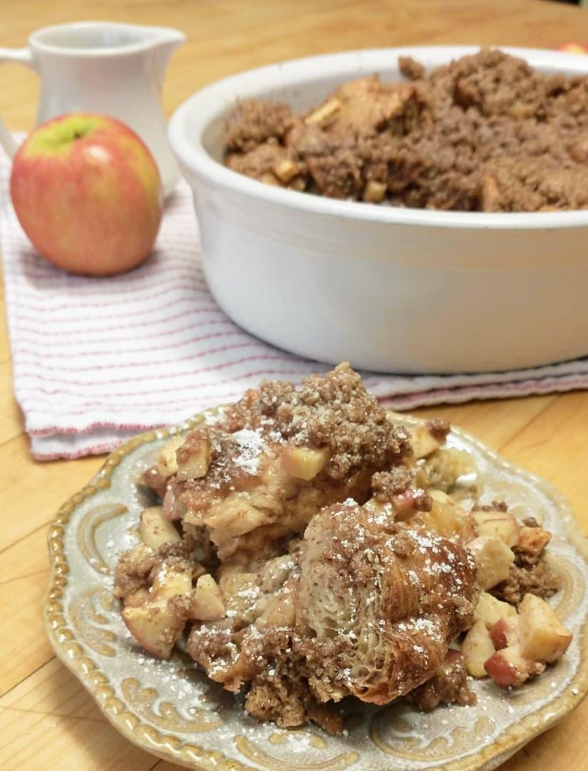 Apple Crisp French Toast Casserole in a baking dish, golden brown and bubbly