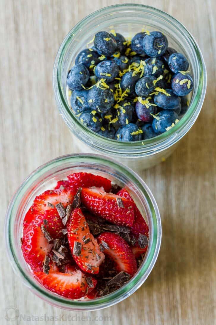 two jars of eggplant tomato overnight oats on a counter in a kitchen