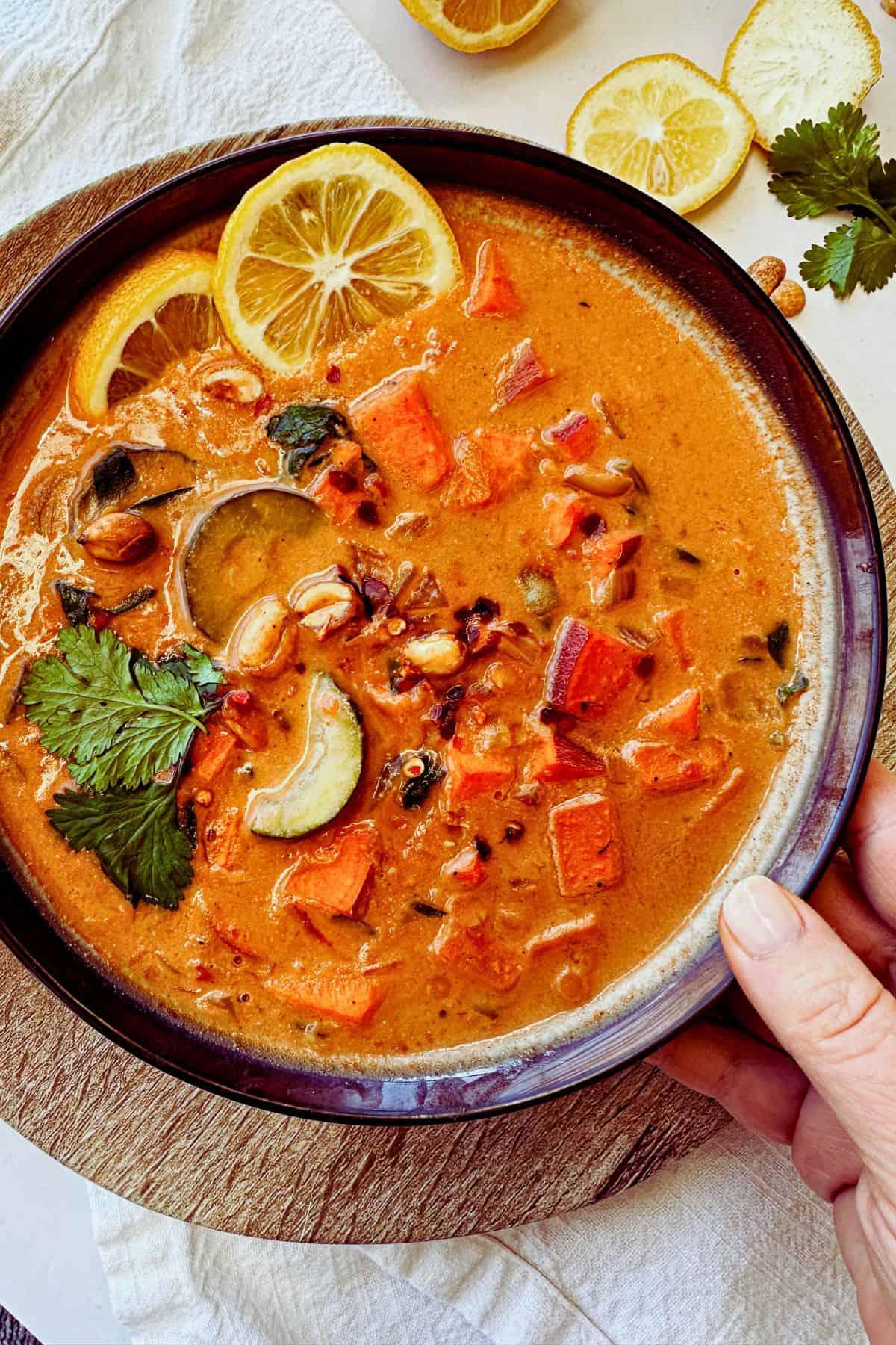 blended vegan sweet potato and peanut soup in a blender