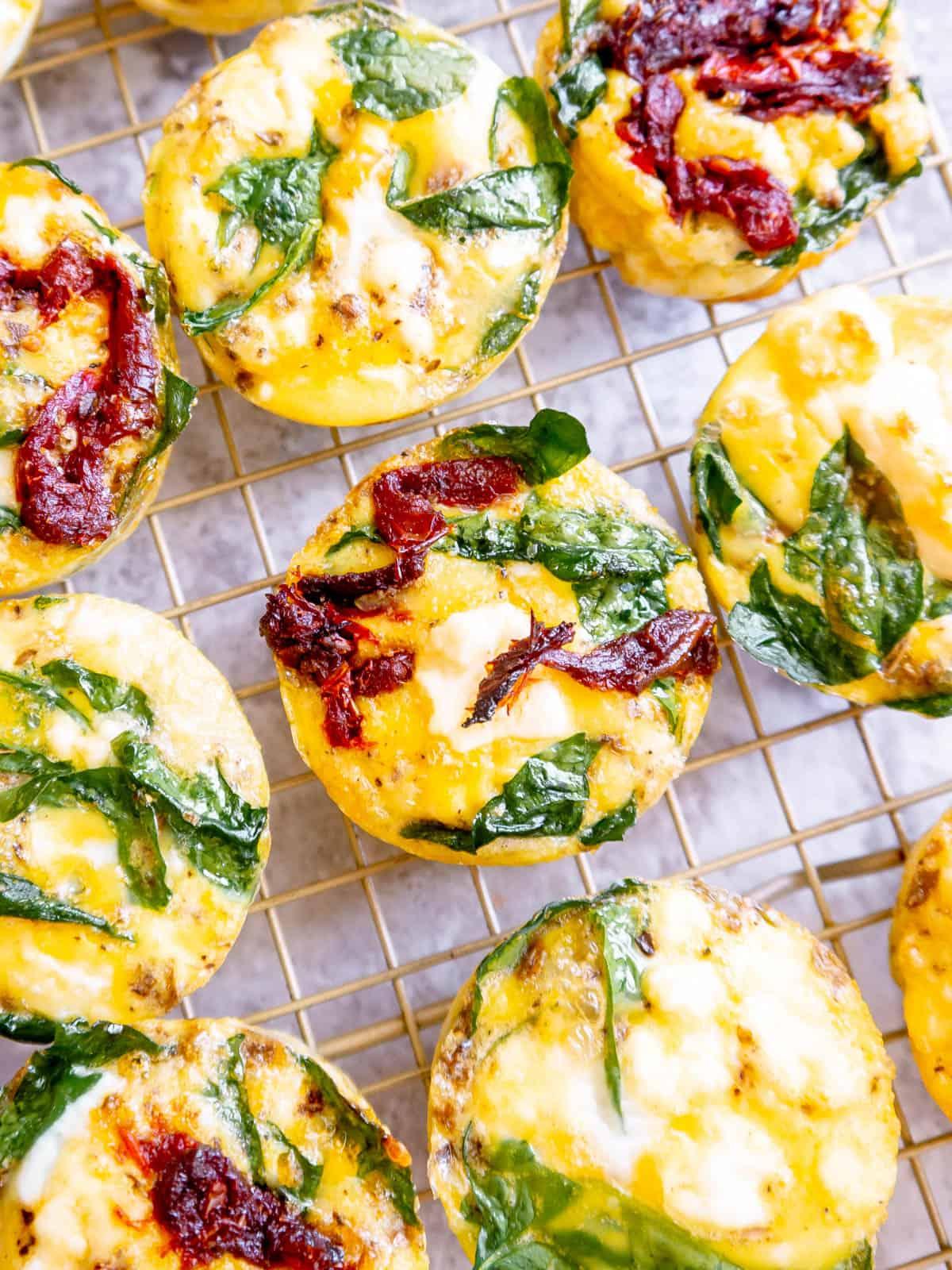 paleo egg and bacon muffins with olive and dairy-free feta