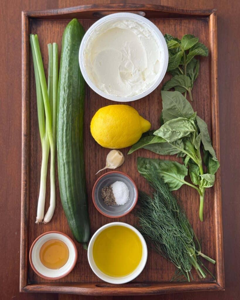 ingredients for cucumber and greek yogurt gazpacho laid out on a table