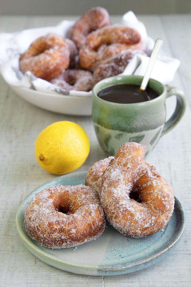 a plate of bagel zeppole being served