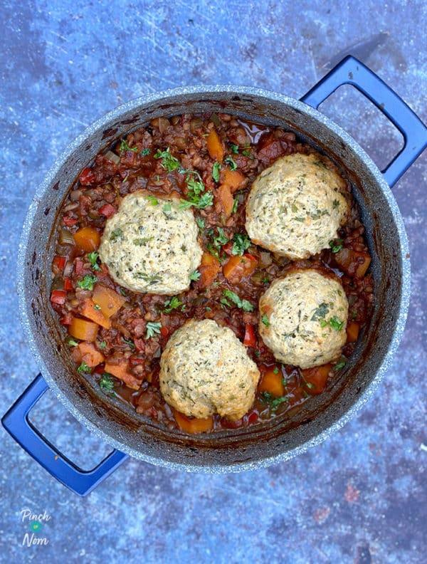 close-up of herbed dumplings in lentil soup