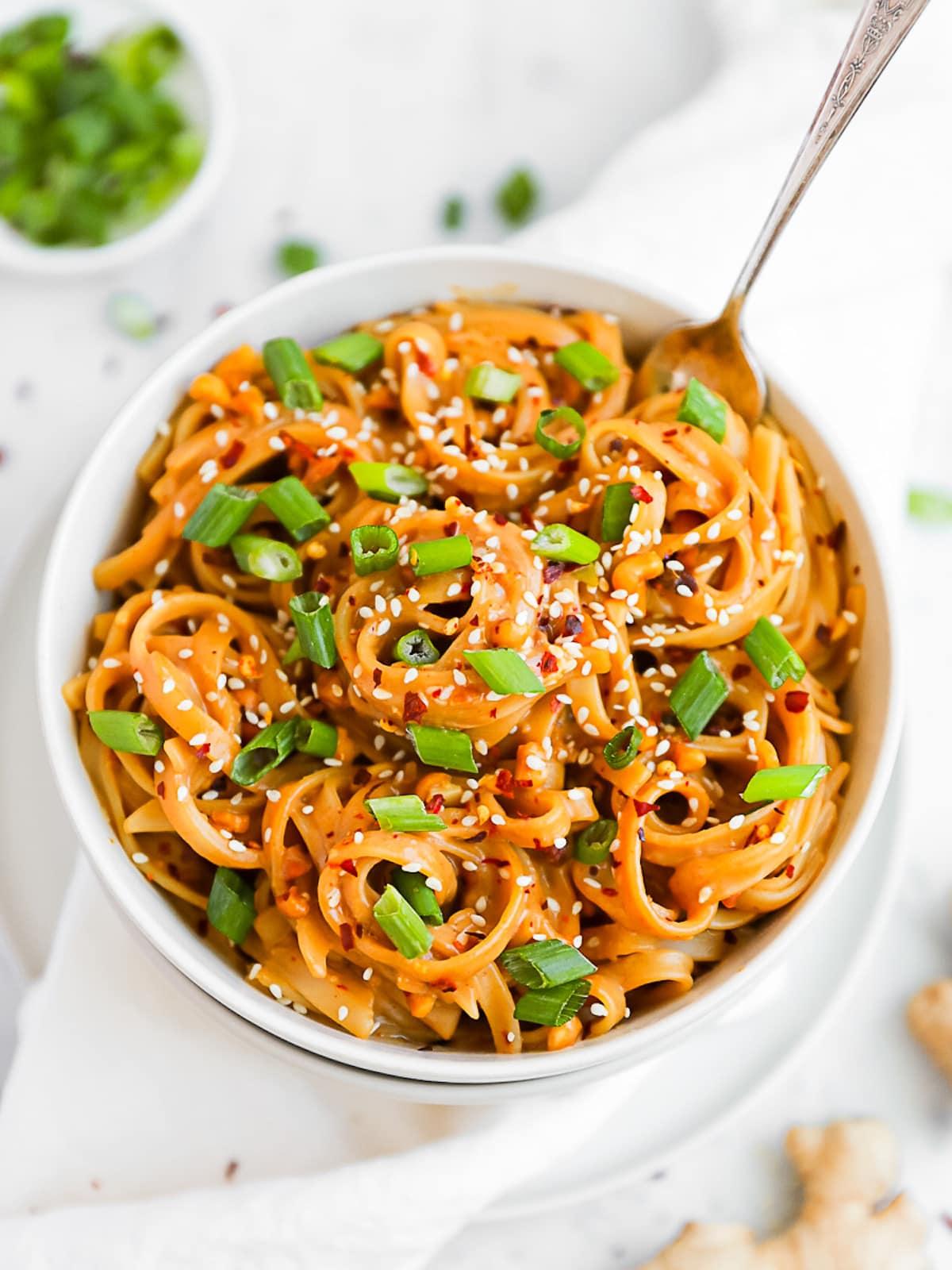 delicious spicy peanut noodles in a bowl