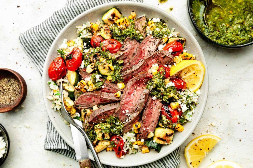 Overhead shot of a beautifully arranged Garlic Butter Steak Protein Bowl