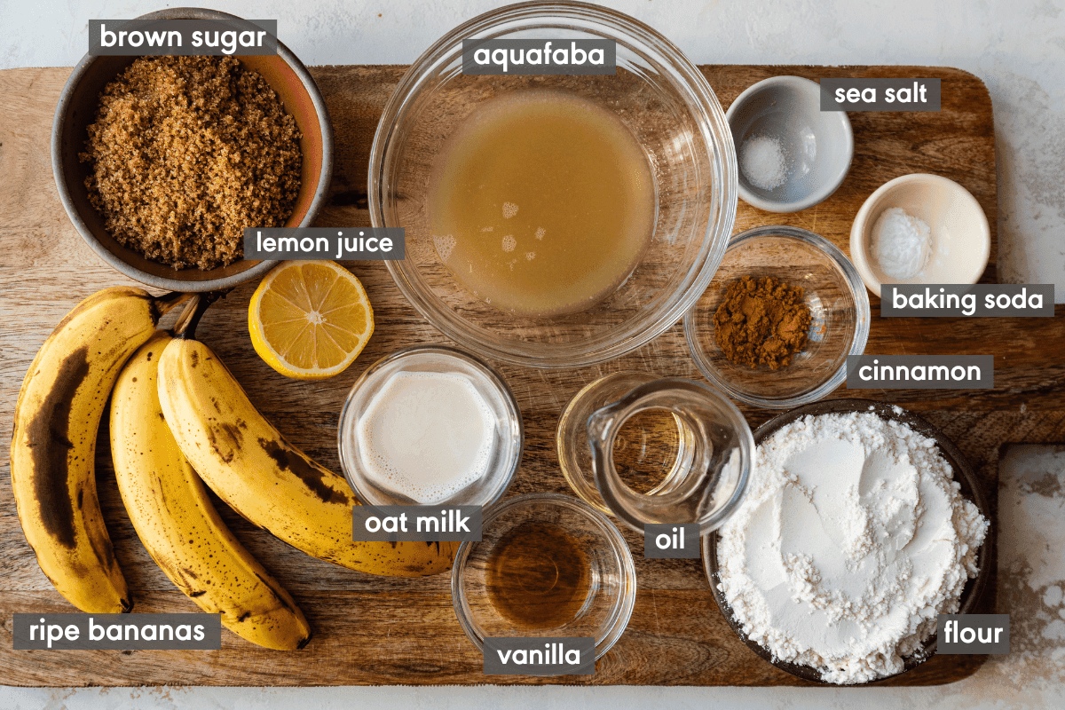 ingredients for banana walnut bread laid out on a wooden table