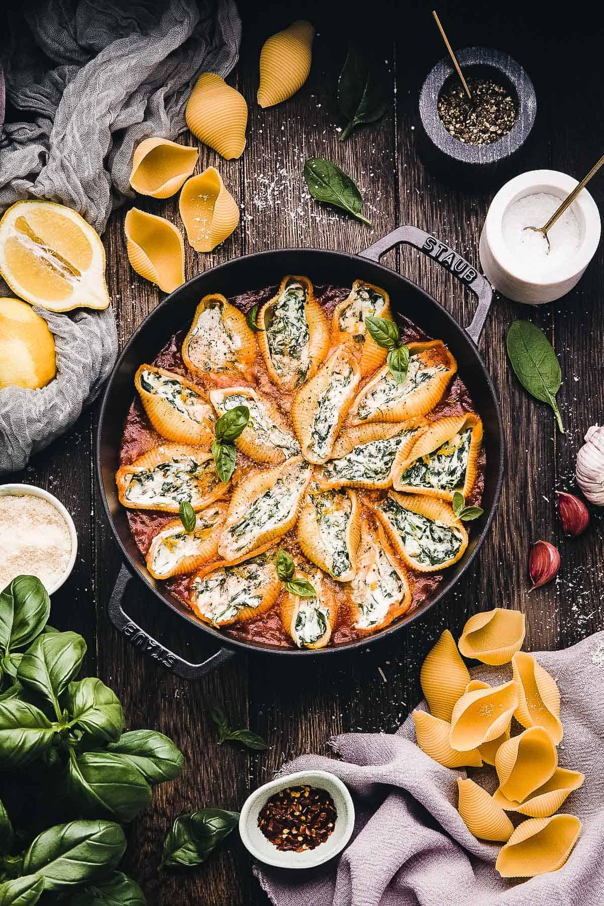 overhead shot of a plate of spinach and ricotta stuffed shells