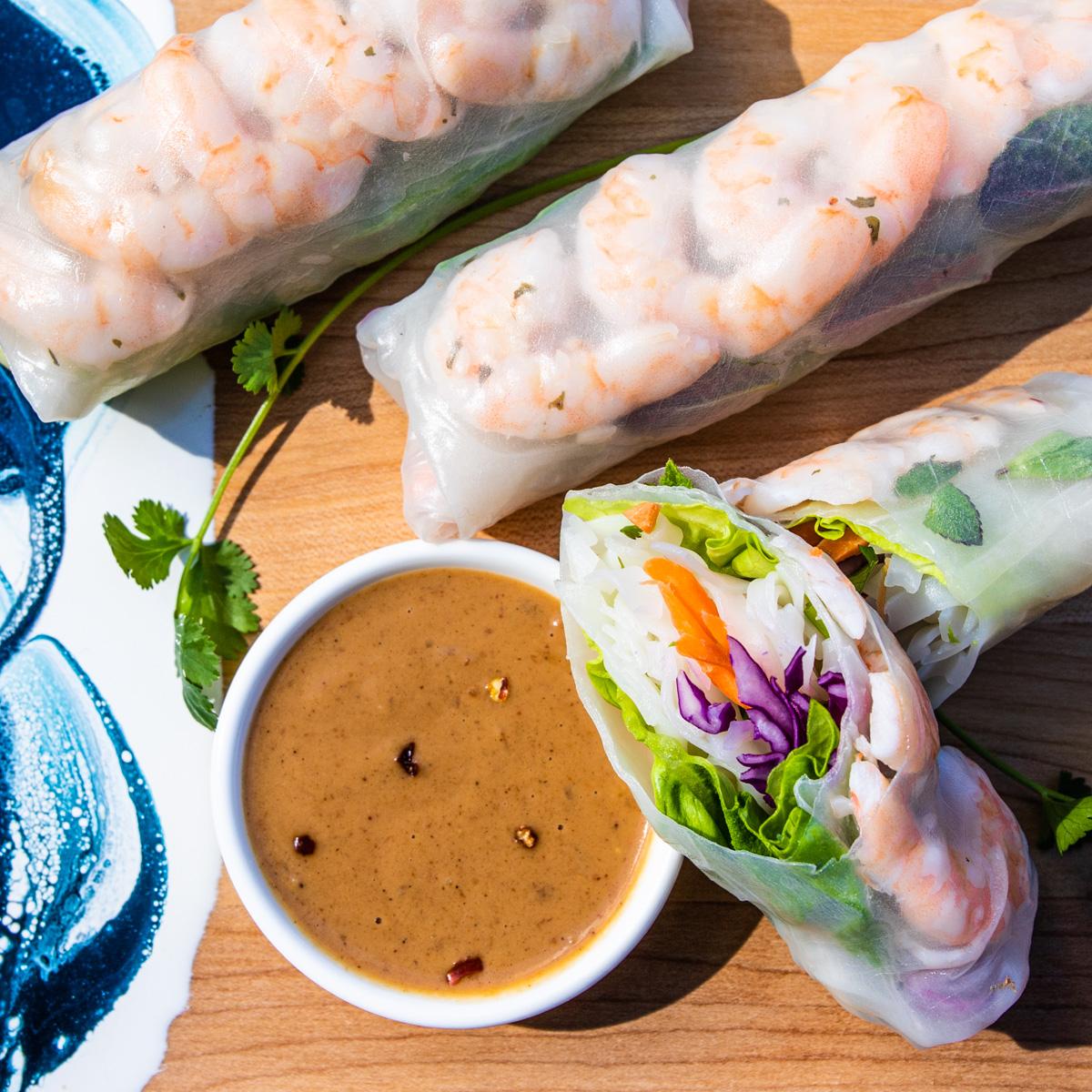 sautéed seafood summer rolls with dipping sauce