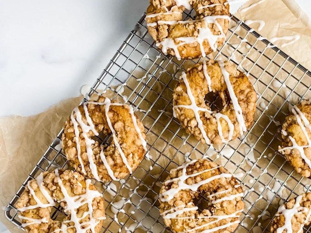 baked coffee cake donuts cooling on a wire rack