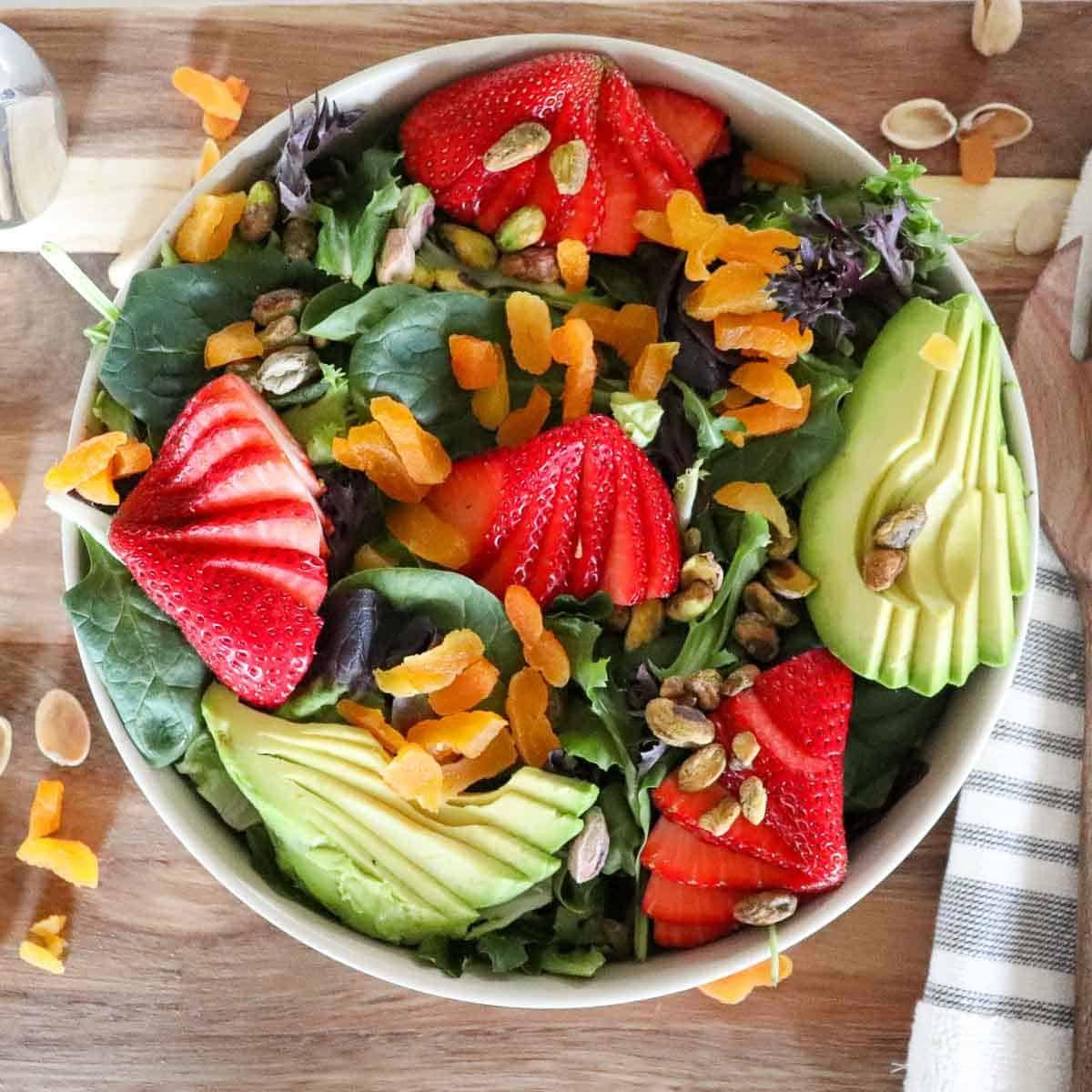 A vibrant Spring Strawberry Kumquat Blossom Kiss Salad