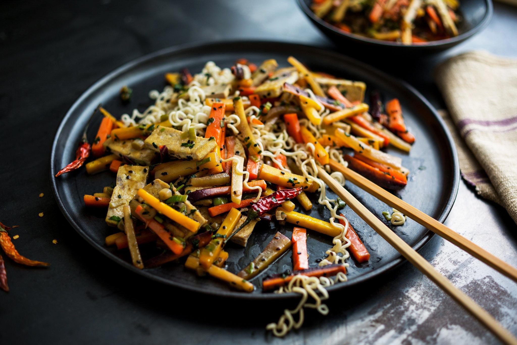 a close-up shot of the Carrot Craze Vegetable Stir-Fry, highlighting the vibrant colors and textures