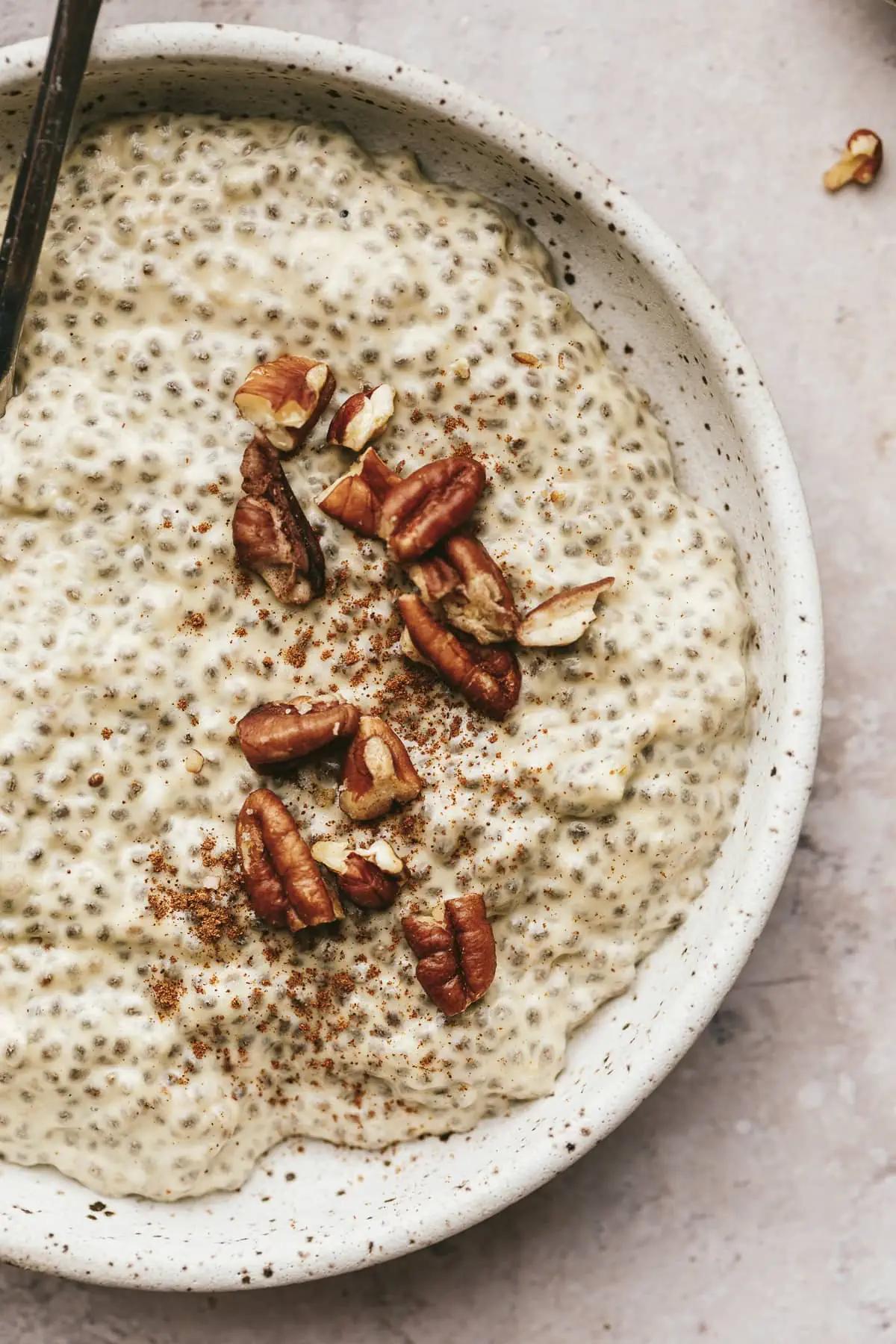 warm butter pecan chia seed pudding in a cozy setting