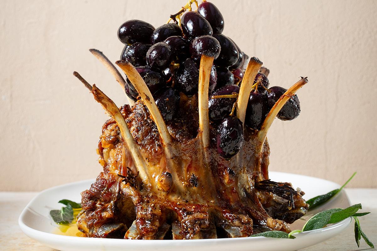 Rack of lamb being carved at an Easter table