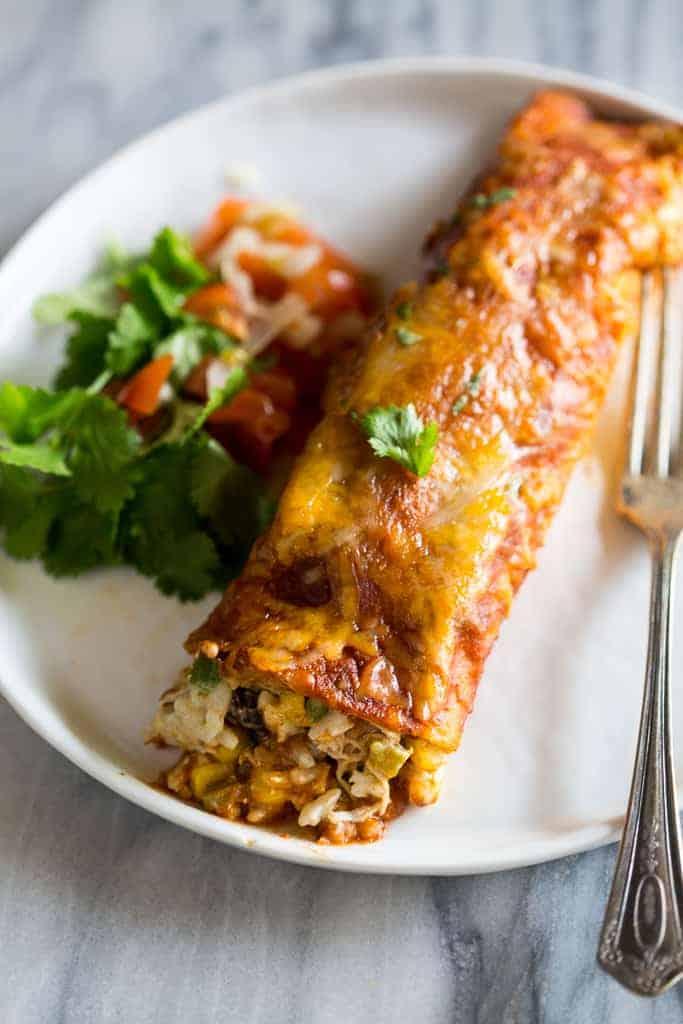 plate of enchiladas with a variety of fillings