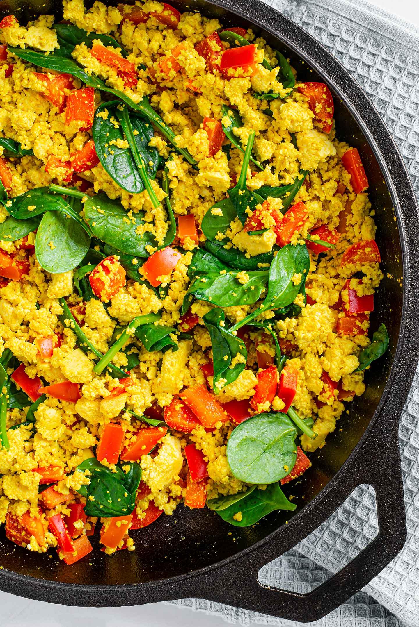 A colorful and appetizing Moroccan Tofu Scramble in a skillet