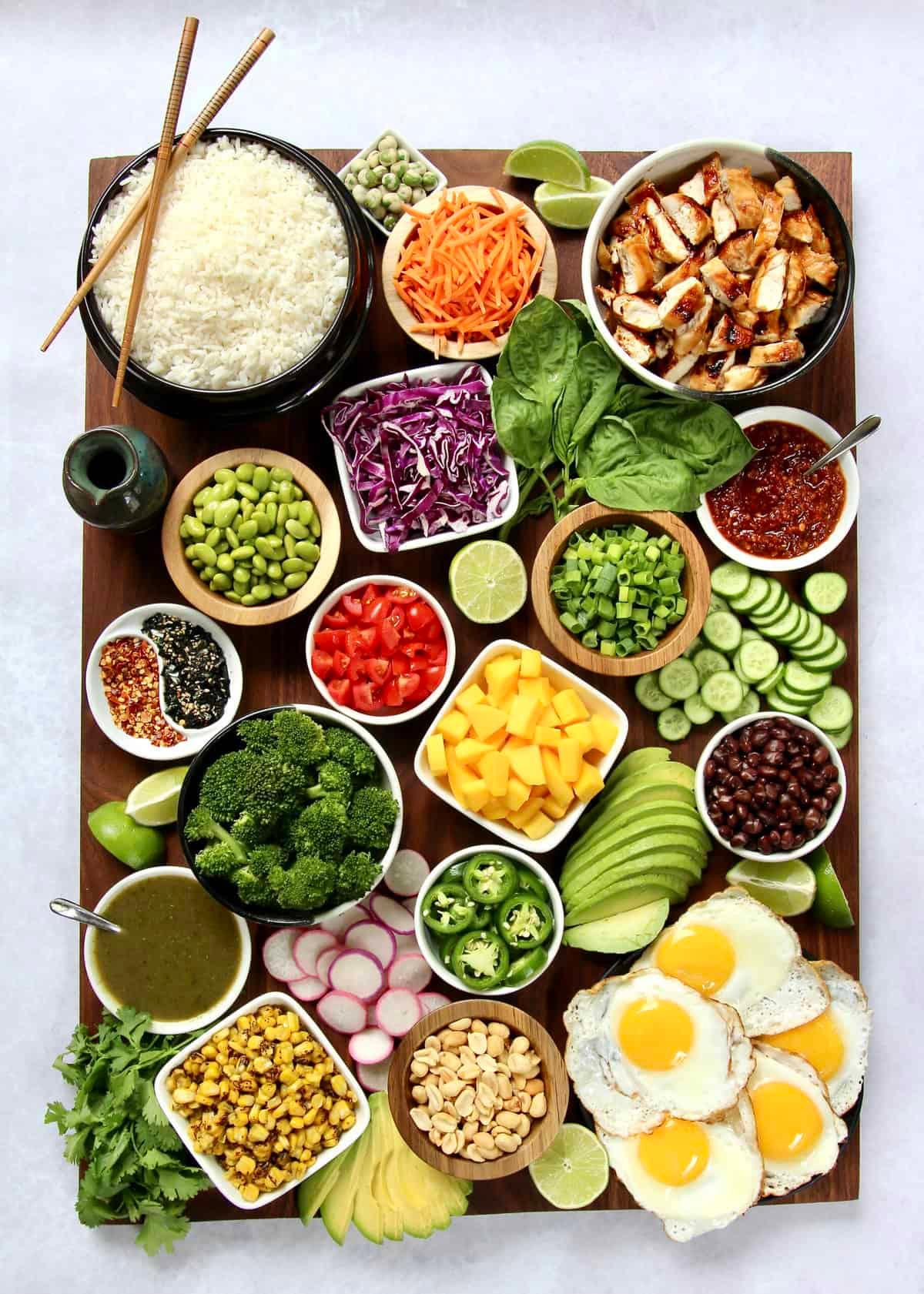 Kids making their own rice bowls