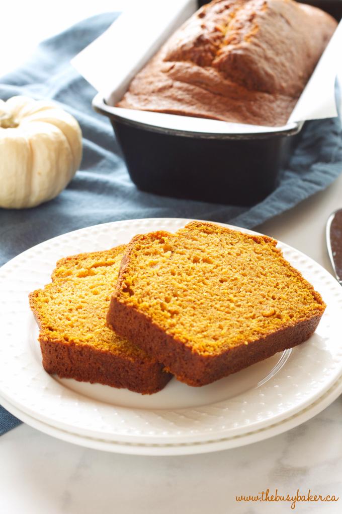 a slice of pumpkin bread with visible spices and moist texture
