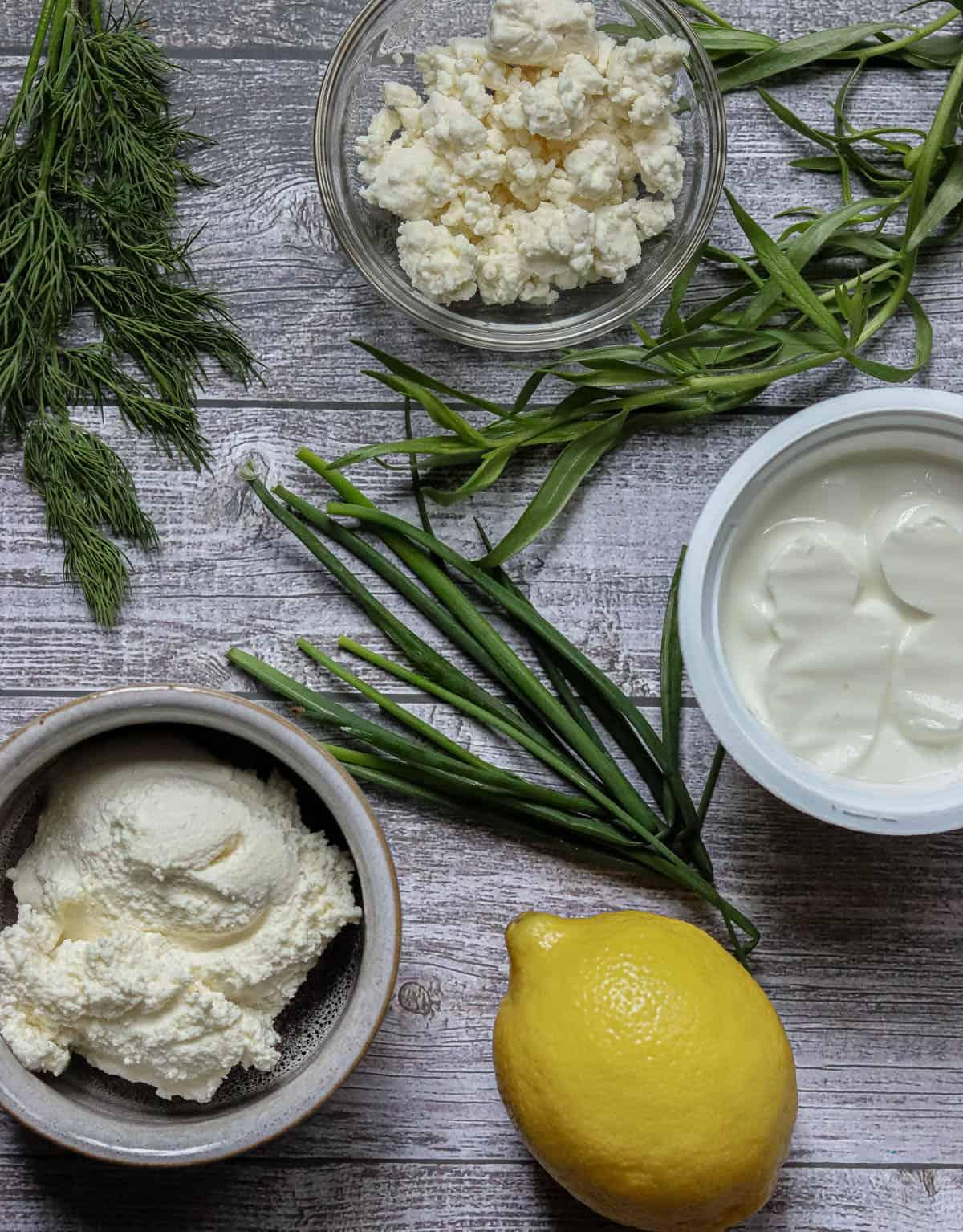 ingredients for green goddess dip laid out on a kitchen counter