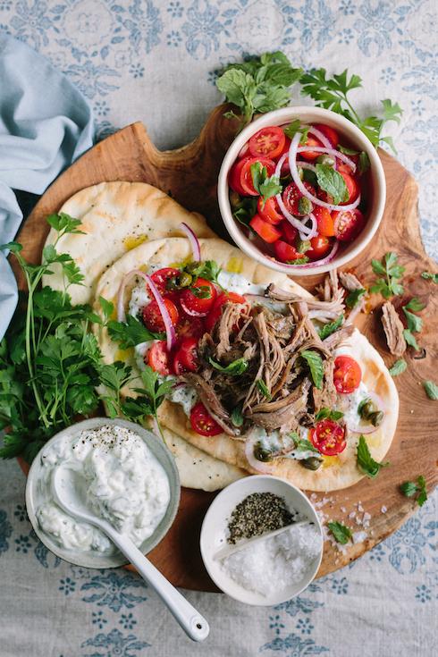 slow roasted lamb gyro sliced and served in pita bread with tzatziki sauce