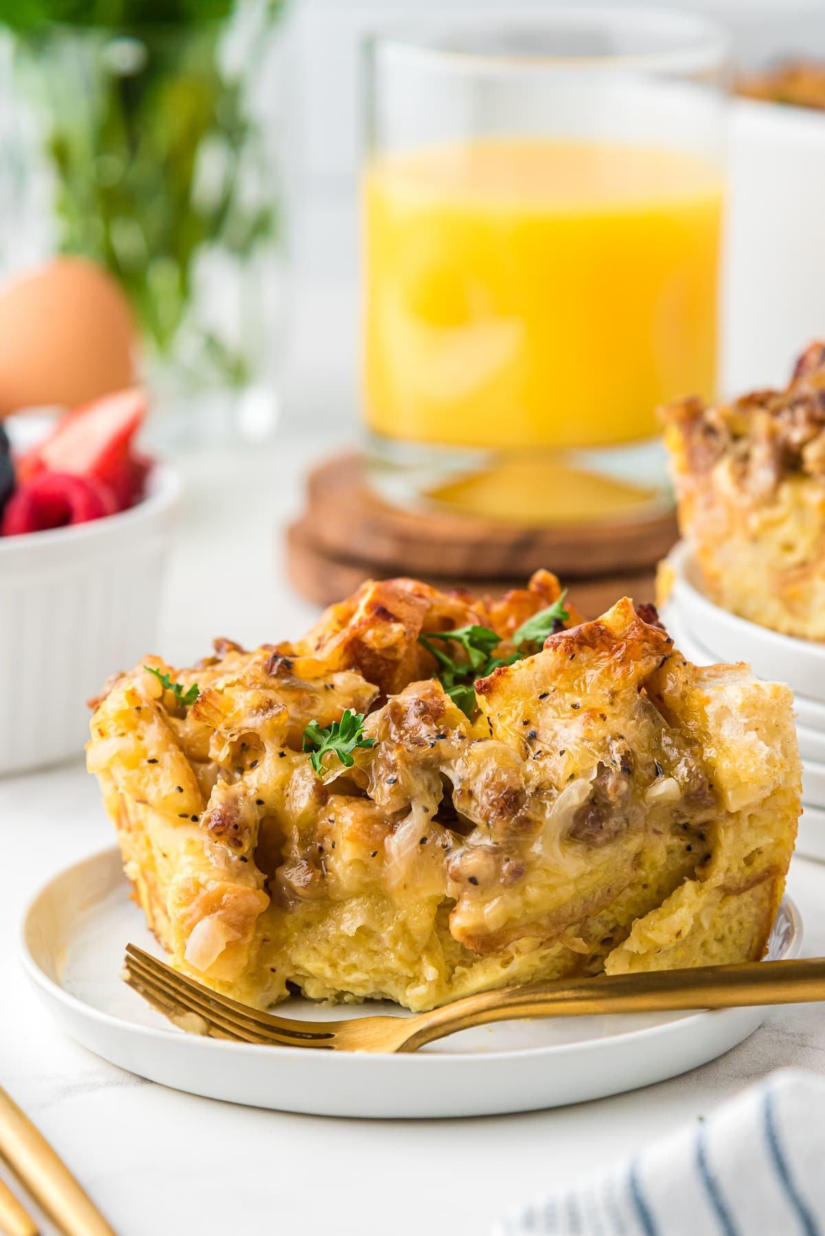 Close-up of baked breakfast casserole with golden eggs and melted cheese