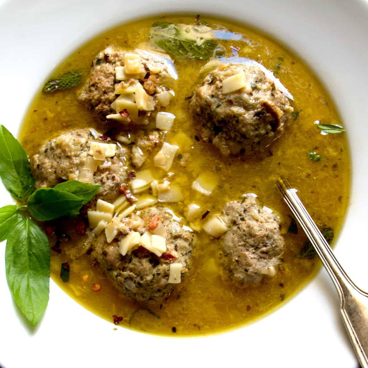 hearty bowl of Arctic Circle Albondigas Stew with a sprig of dill