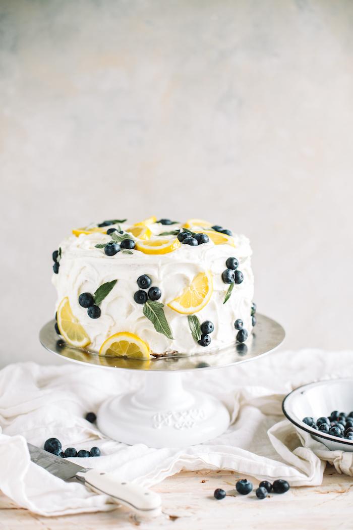 Spring Lemon Chiffon Cake decorated with fresh berries and lemon slices
