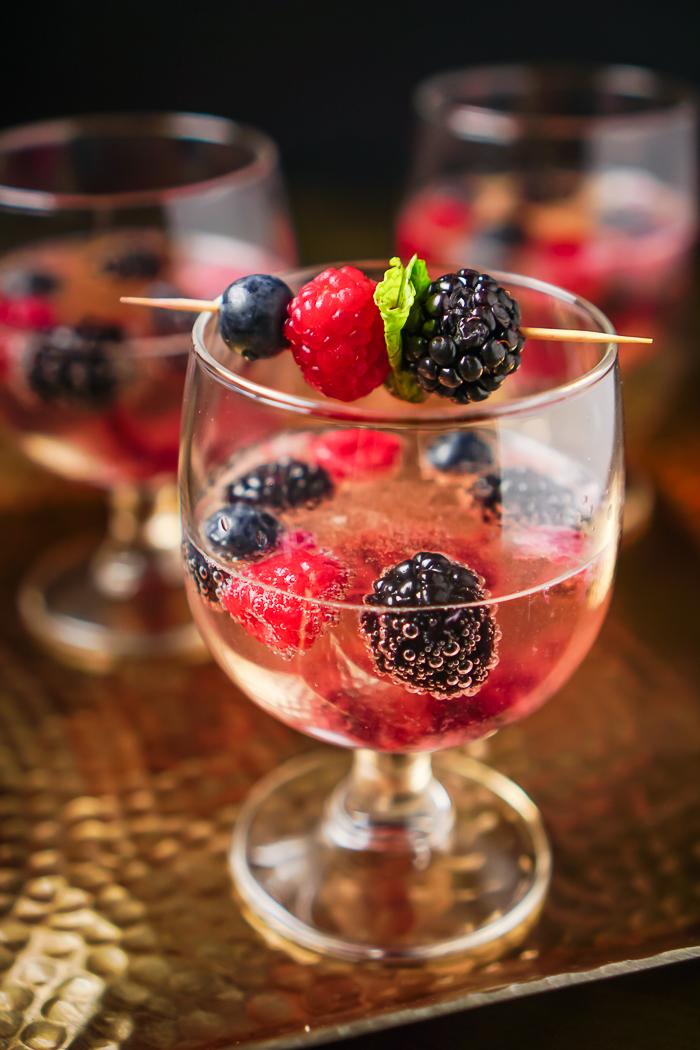 fresh berries in champagne glass