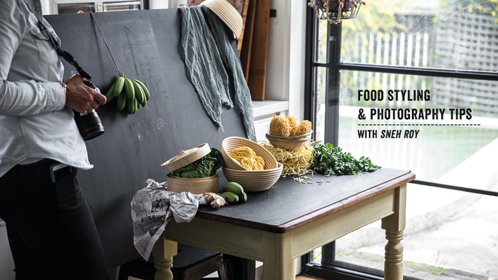 food stylist setting up food for photography