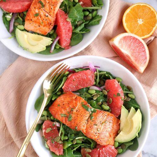 Overhead shot of Smoked Salmon and Grapefruit Salad with ingredients scattered around